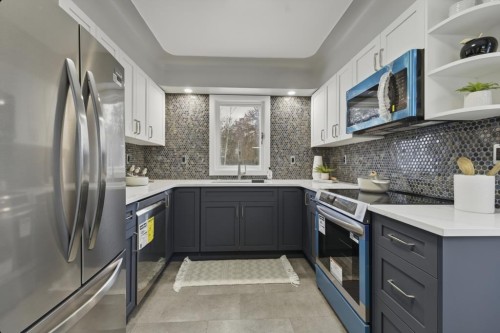 5321 42 Avenue, Red Deer, AB - Indoor Photo Showing Kitchen With Upgraded Kitchen