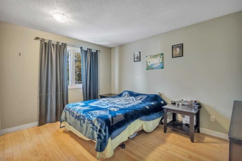 65 Gunn Street, Red Deer, AB - Indoor Photo Showing Bedroom