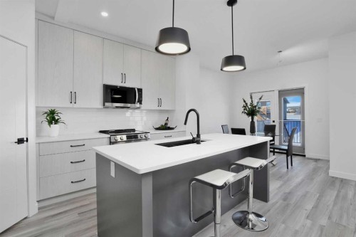 18 Palmer Circle, Blackfalds, AB - Indoor Photo Showing Kitchen With Upgraded Kitchen