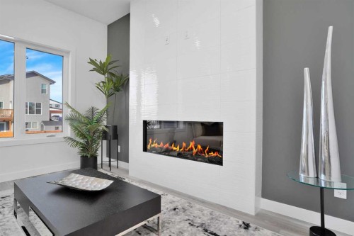 18 Palmer Circle, Blackfalds, AB - Indoor Photo Showing Other Room With Fireplace