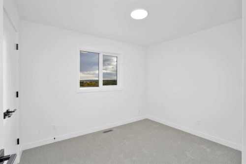 18 Palmer Circle, Blackfalds, AB - Indoor Photo Showing Other Room
