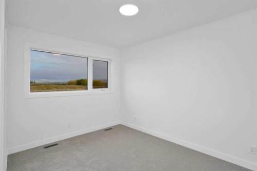 18 Palmer Circle, Blackfalds, AB - Indoor Photo Showing Other Room