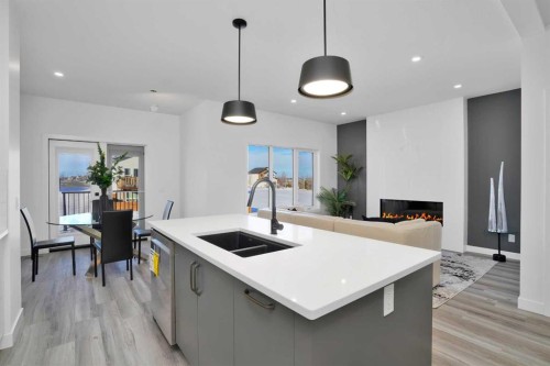 18 Palmer Circle, Blackfalds, AB - Indoor Photo Showing Kitchen With Double Sink
