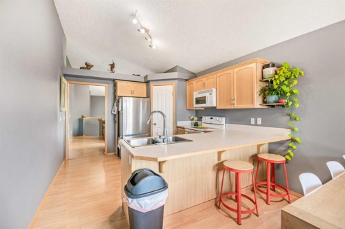 27 Jacobs Close, Red Deer, AB - Indoor Photo Showing Kitchen With Double Sink
