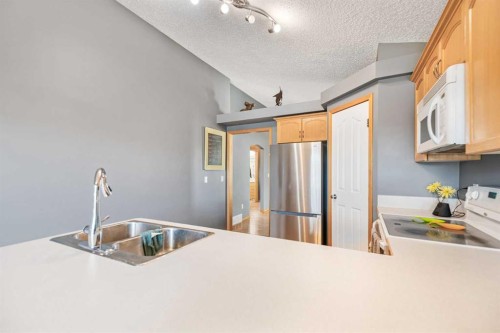 27 Jacobs Close, Red Deer, AB - Indoor Photo Showing Kitchen With Double Sink