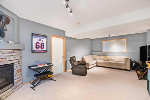 27 Jacobs Close, Red Deer, AB - Indoor With Fireplace