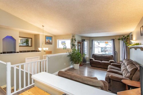 34 Iron Wolf Ridge, Lacombe, AB - Indoor Photo Showing Living Room