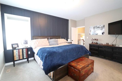 3904 48A Avenue, Ponoka, AB - Indoor Photo Showing Bedroom