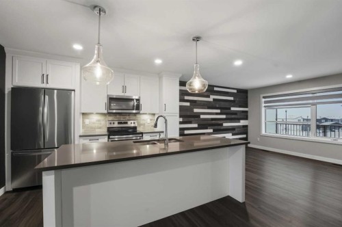 4140 Ryders Ridge Boulevard, Sylvan Lake, AB - Indoor Photo Showing Kitchen With Stainless Steel Kitchen With Upgraded Kitchen