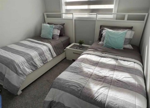 4140 Ryders Ridge Boulevard, Sylvan Lake, AB - Indoor Photo Showing Bedroom