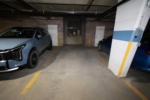 123-4512 52 Avenue, Red Deer, AB - Indoor Photo Showing Garage