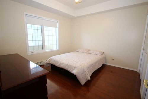 123-4512 52 Avenue, Red Deer, AB - Indoor Photo Showing Bedroom