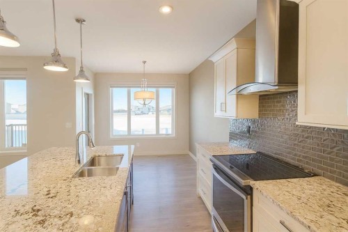 4244 Westbrook Road, Blackfalds, AB - Indoor Photo Showing Kitchen With Double Sink With Upgraded Kitchen