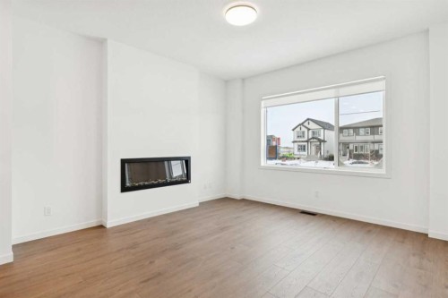 3586 Chestermere Boulevard, Chestermere, AB - Indoor Photo Showing Living Room With Fireplace