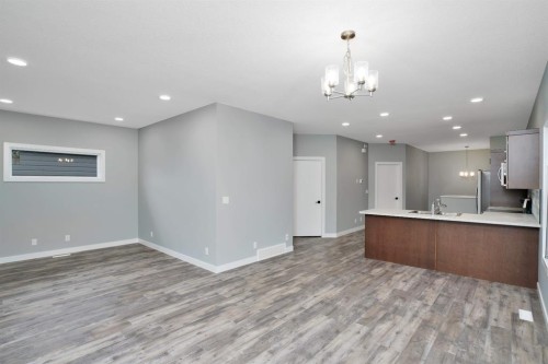 112 Hinshaw Drive, Sylvan Lake, AB - Indoor Photo Showing Other Room