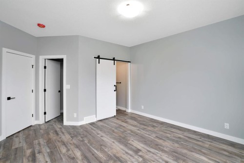 112 Hinshaw Drive, Sylvan Lake, AB - Indoor Photo Showing Other Room