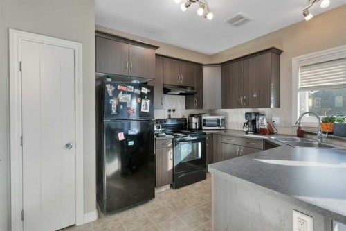 3 Ross Close, Sylvan Lake, AB - Indoor Photo Showing Kitchen With Double Sink