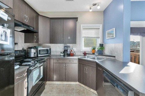 3 Ross Close, Sylvan Lake, AB - Indoor Photo Showing Kitchen With Double Sink