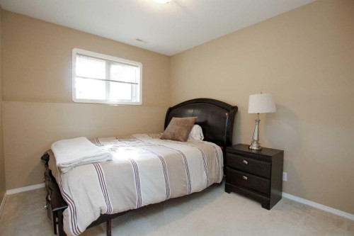 13 Kenny Close, Red Deer, AB - Indoor Photo Showing Bedroom