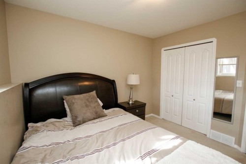13 Kenny Close, Red Deer, AB - Indoor Photo Showing Bedroom