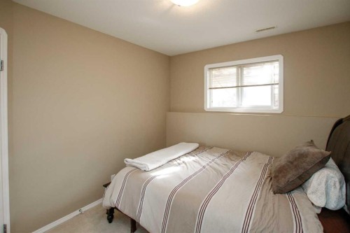 13 Kenny Close, Red Deer, AB - Indoor Photo Showing Bedroom