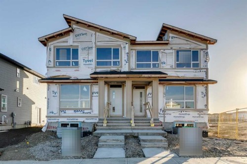 121 Bridgeport Gate North, Chestermere, AB - Outdoor With Facade