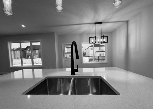 53 Emmett Crescent, Red Deer, AB - Indoor Photo Showing Kitchen With Double Sink