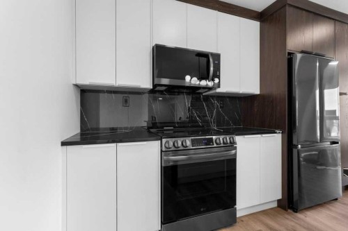 12 Violet Point, Sylvan Lake, AB - Indoor Photo Showing Kitchen