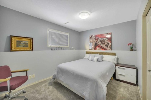 114 Old Boomer Road, Sylvan Lake, AB - Indoor Photo Showing Bedroom