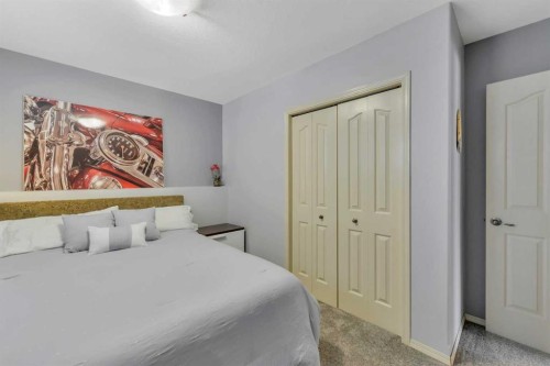 114 Old Boomer Road, Sylvan Lake, AB - Indoor Photo Showing Bedroom