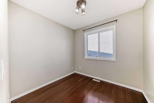 42 Somerside Place Sw, Calgary, AB - Indoor Photo Showing Other Room