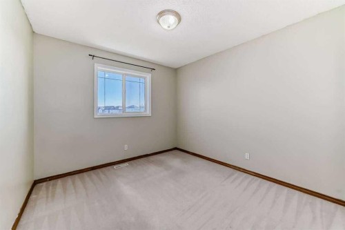 42 Somerside Place Sw, Calgary, AB - Indoor Photo Showing Other Room