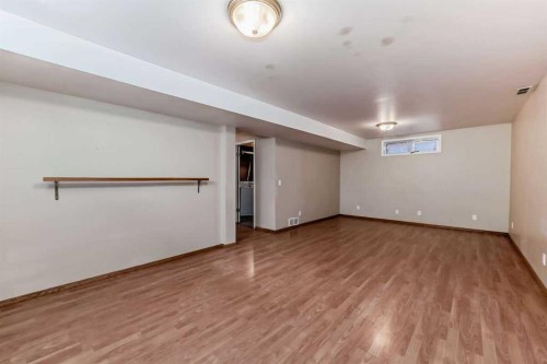 42 Somerside Place Sw, Calgary, AB - Indoor Photo Showing Other Room
