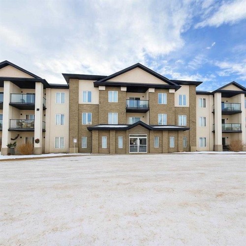 219-80A Kelloway Crescent, Red Deer, AB - Outdoor With Balcony With Facade