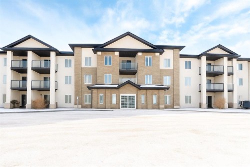 319-80A Kelloway Crescent, Red Deer, AB - Outdoor With Balcony With Facade