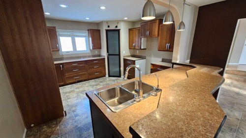 5112 52 Avenue, Consort, AB - Indoor Photo Showing Kitchen With Double Sink