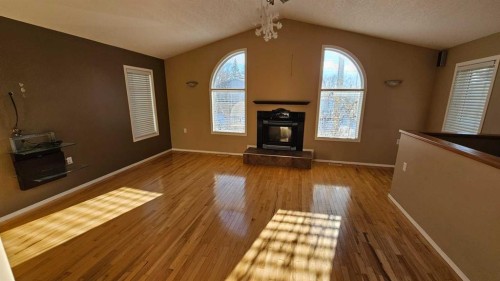 5112 52 Avenue, Consort, AB - Indoor With Fireplace