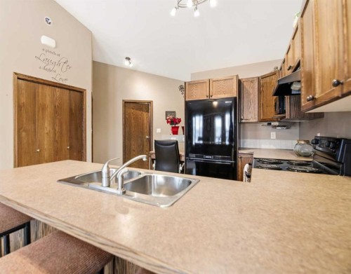 14 Winston Place, Blackfalds, AB - Indoor Photo Showing Kitchen With Double Sink