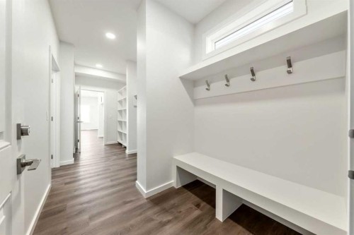 8 Heritage Link, Cochrane, AB - Indoor Photo Showing Other Room