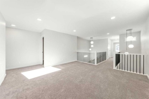 8 Heritage Link, Cochrane, AB - Indoor Photo Showing Other Room