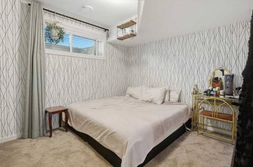 51 Lake Street, Rural Red Deer County, AB - Indoor Photo Showing Bedroom