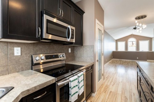 6321 58 Avenue, Innisfail, AB - Indoor Photo Showing Kitchen With Stainless Steel Kitchen With Upgraded Kitchen