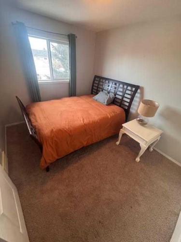 4617 47 Street, Rocky Mountain House, AB - Indoor Photo Showing Bedroom