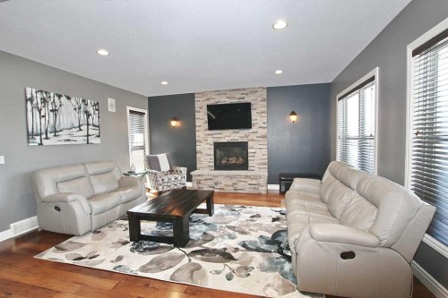 6 Laurel Close, Sylvan Lake, AB - Indoor Photo Showing Living Room With Fireplace