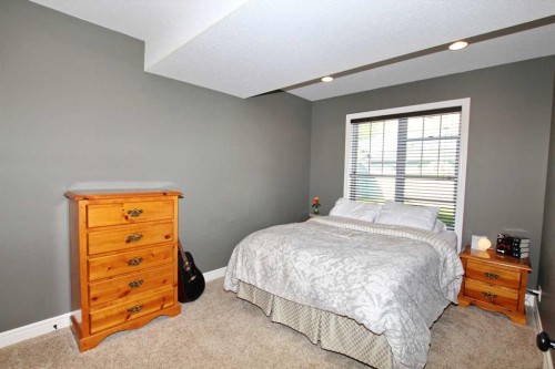 6 Laurel Close, Sylvan Lake, AB - Indoor Photo Showing Bedroom