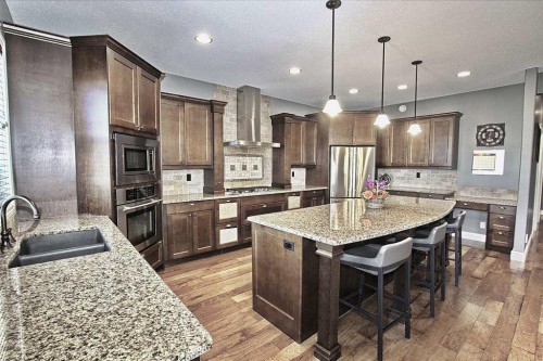 6 Laurel Close, Sylvan Lake, AB - Indoor Photo Showing Kitchen With Double Sink With Upgraded Kitchen