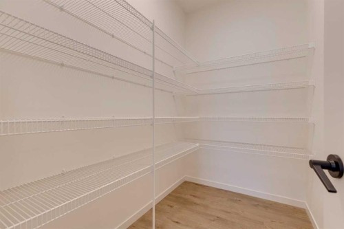 1402 Bayview Crescent Sw, Airdrie, AB - Indoor With Storage