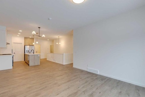 1402 Bayview Crescent Sw, Airdrie, AB - Indoor Photo Showing Kitchen