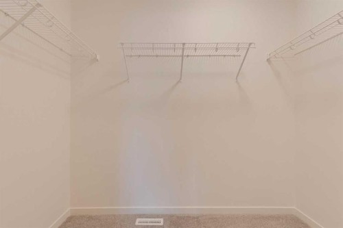 1402 Bayview Crescent Sw, Airdrie, AB - Indoor With Storage