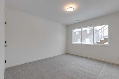 1402 Bayview Crescent Sw, Airdrie, AB - Indoor Photo Showing Other Room